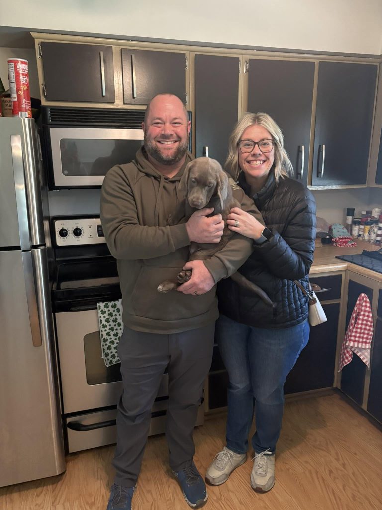 Silver Lab puppies in Northern Kentucky with their new family